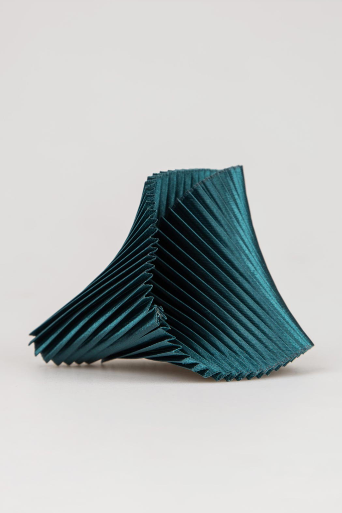 Bracciale in tessuto conchiglia con pieghe