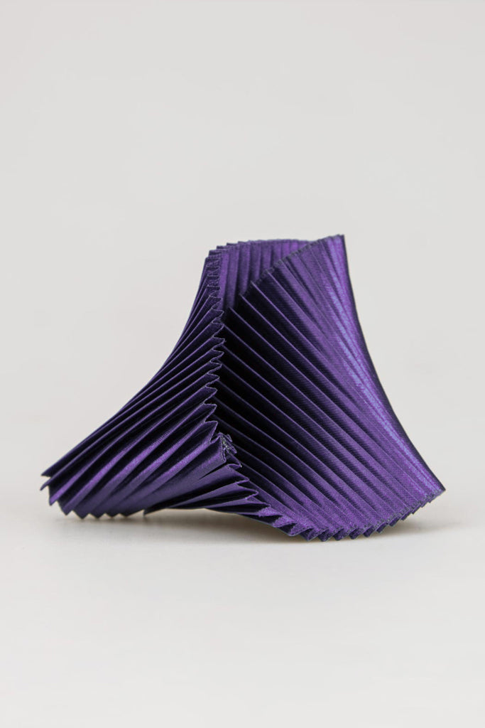 Bracciale in tessuto conchiglia con pieghe