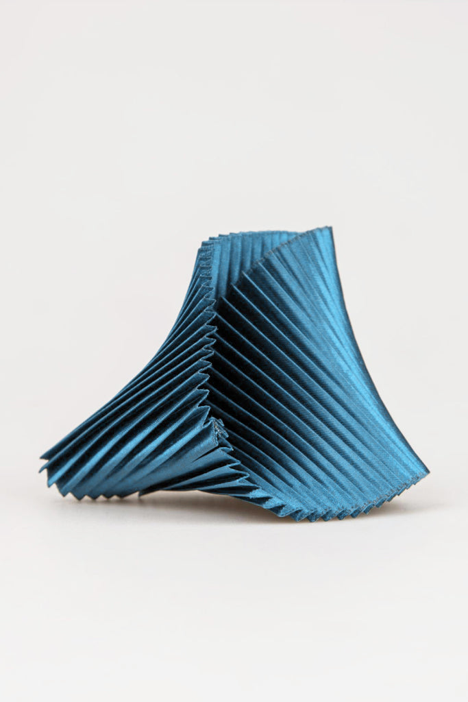 Bracciale in tessuto conchiglia con pieghe